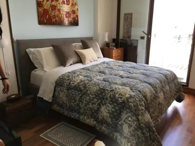 Letto o letti in una camera di Terrazza Morghen Panoramic Rooftop