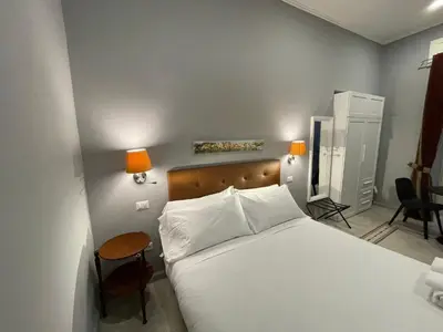 Letto o letti in una camera di La Cornucopia
