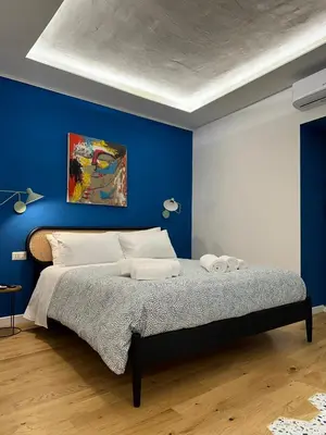 Letto o letti in una camera di Santa Maria Maggiore suite