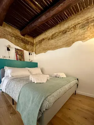 Letto o letti in una camera di Santa Maria Maggiore suite