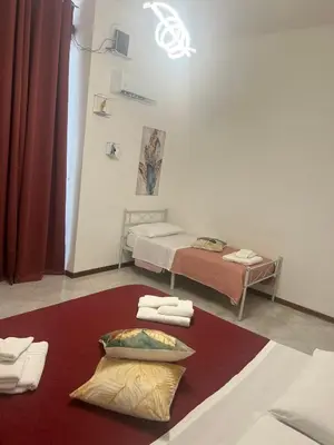 Letto o letti in una camera di Appartamento La Cassaforte Napoli Centro - DUOMO