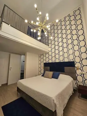 Letto o letti in una camera di Daymoon House Vanvitelli. Napoli