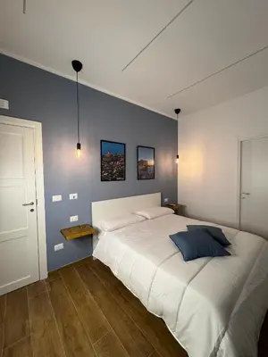 Letto o letti in una camera di Conte di Mola 67