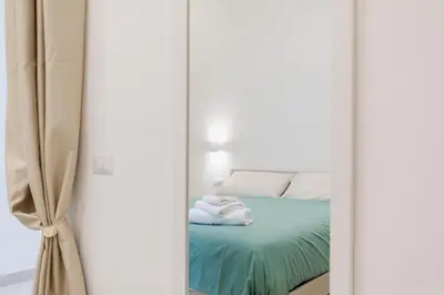 Letto o letti in una camera di O' Munasterio e Santa Chiara