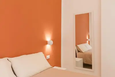 Letto o letti in una camera di O' Munasterio e Santa Chiara