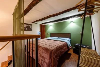 Letto o letti in una camera di Il Basso Re