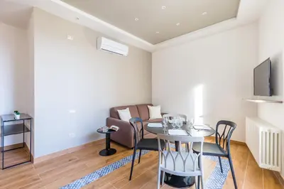Area soggiorno di Colonna Apartments by Wonderful Italy