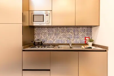 Cucina o angolo cottura di Colonna Apartments by Wonderful Italy