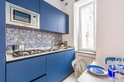 Cucina o angolo cottura di Colonna Apartments by Wonderful Italy