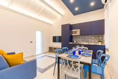 Cucina o angolo cottura di Colonna Apartments by Wonderful Italy