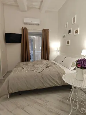 Letto o letti in una camera di THAT'S AMORE DECUMANI