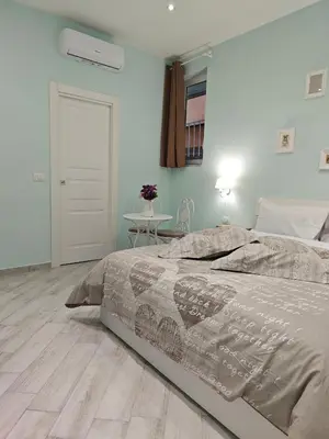 Letto o letti in una camera di THAT'S AMORE DECUMANI