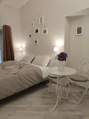 Letto o letti in una camera di THAT'S AMORE DECUMANI