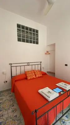 Letto o letti in una camera di Queen Carolina's Homes - Apartments in Old Town