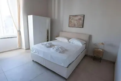 Letto o letti in una camera di Maison Julie By Dimorra