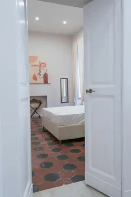 Letto o letti in una camera di Maison Julie By Dimorra