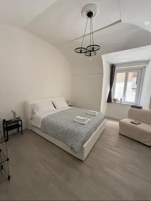 Letto o letti in una camera di Casa Baglioni
