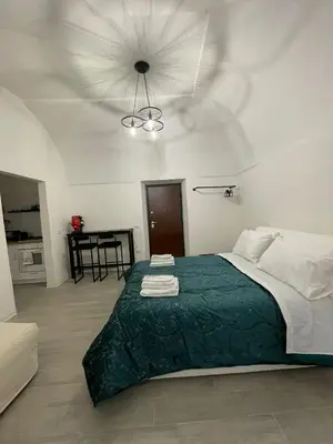 Letto o letti in una camera di Casa Baglioni