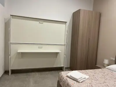Letto o letti in una camera di Neapolis francy Vesuvio