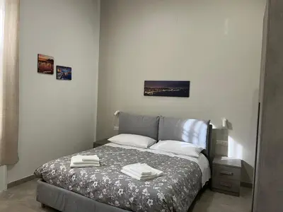 Letto o letti in una camera di Neapolis Francy marechiaro