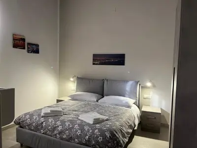 Letto o letti in una camera di Neapolis Francy marechiaro
