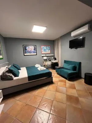 TV o dispositivi per l'intrattenimento presso Naples Luxury Suites B&B