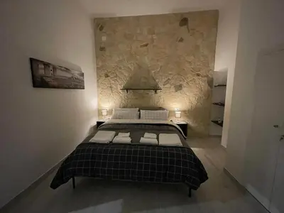 Letto o letti in una camera di CASA MASADA