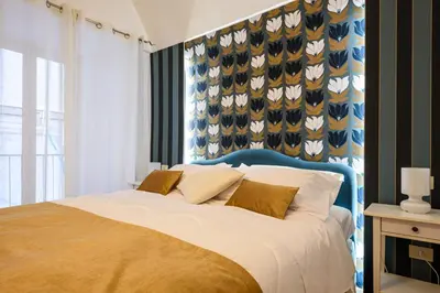 Letto o letti in una camera di A Casa di Ersi - Dimore Partenopee