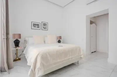 Letto o letti in una camera di La Corte dei Mille Luxury