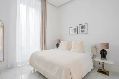 Letto o letti in una camera di La Corte dei Mille Luxury