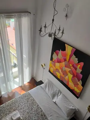 Letto o letti in una camera di Residence e appartamenti Cavallerizza