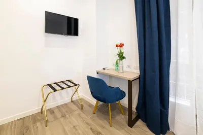 TV o dispositivi per l'intrattenimento presso Santa Teresa luxury rooms
