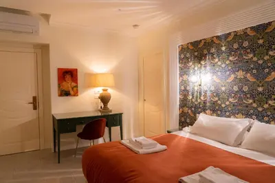 Letto o letti in una camera di Domus Sibyllina, Palazzo Cavalcanti