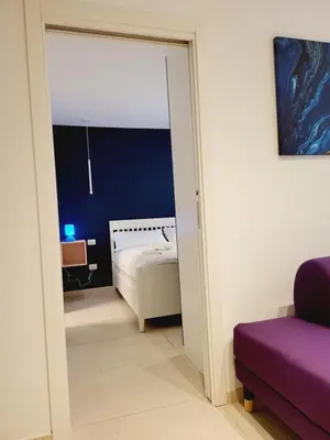 Letto o letti in una camera di Bovio 33 Napoli art apartment