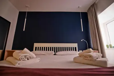 Letto o letti in una camera di Bovio 33 Napoli art apartment