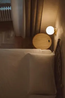 Letto o letti in una camera di Librai suite
