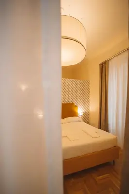 Letto o letti in una camera di Librai suite