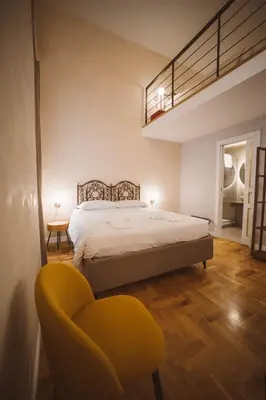 Letto o letti in una camera di Librai suite