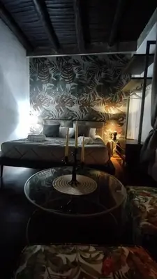 Area soggiorno di Plebiscito Suite Apartment