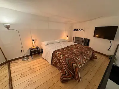 Letto o letti in una camera di Domus Miraculi: Casa storica nel cuore di Napoli