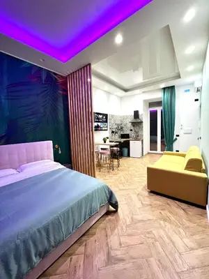 Letto o letti in una camera di Loft in Borgo