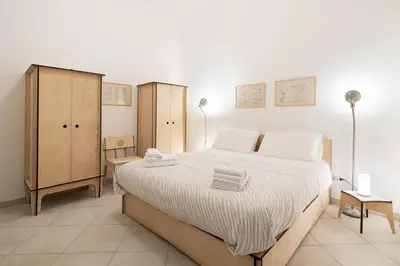 Letto o letti in una camera di Salita Trinità
