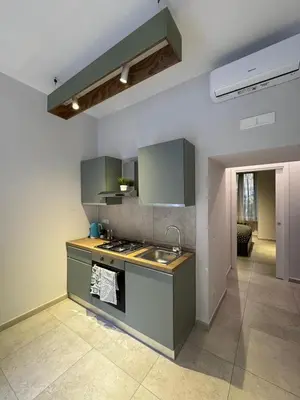 Cucina o angolo cottura di Mirea Apartments - Napoli