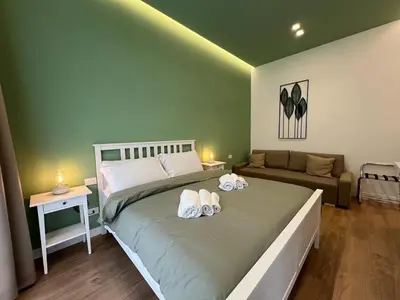 Letto o letti in una camera di Casa Imperatore