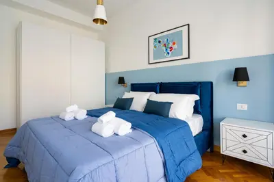 Letto o letti in una camera di Blue&Green Chiaia