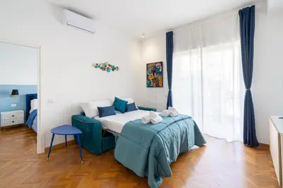 Letto o letti in una camera di Blue&Green Chiaia
