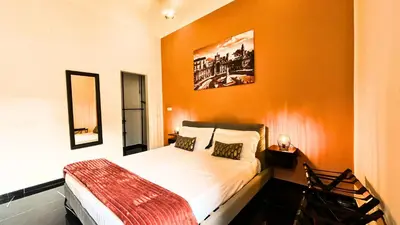 Letto o letti in una camera di Palazzo Goyze