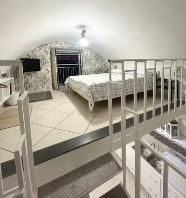 Letto o letti in una camera di Casa Della Felicità