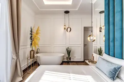 Letto o letti in una camera di ATAROOMS Suites Napoli