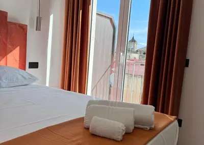 Letto o letti in una camera di FP Suite